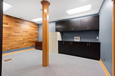 The main level offers 1,365 square feet, providing four offices - photo 7