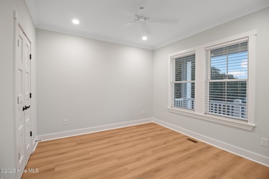 Experience refined coastal living in the heart of Emerald Isle