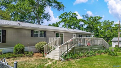Tucked away near Weiss Lake, this home offers the kind of - photo 29