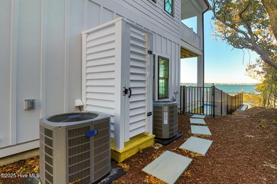 Experience refined coastal living in the heart of Emerald Isle