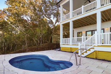 Experience refined coastal living in the heart of Emerald Isle