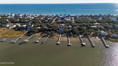 Experience refined coastal living in the heart of Emerald Isle