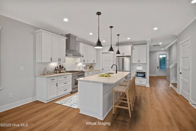 Experience refined coastal living in the heart of Emerald Isle