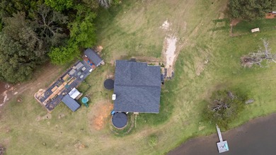 Tucked away behind a private, cypress-lined driveway lies a - photo 31