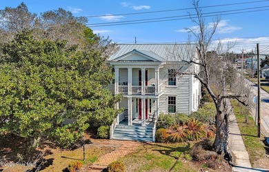 Steeped in history, this 5-bedroom, nearly 3,000SF home in - photo 9