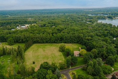 Space, serenity, and sensational design meet at W1818 Lake Rd! - photo 15