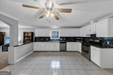 Located in the heart of downtown Acworth, this unique and - photo 23