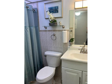 THIS COMFORTABLE 2 BEDROOM 2 BATHROOM HOME HAS A TASTEFULLY - photo 24