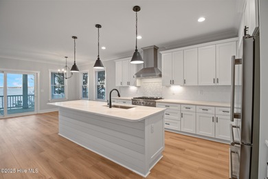 Rare opportunity to own a soundfront luxury duplex townhome in