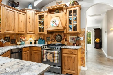 Nestled on a gated 3.39-acre estate in the highly sought-after