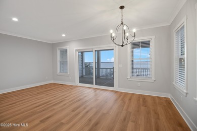 Rare opportunity to own a soundfront luxury duplex townhome in