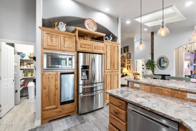 Nestled on a gated 3.39-acre estate in the highly sought-after