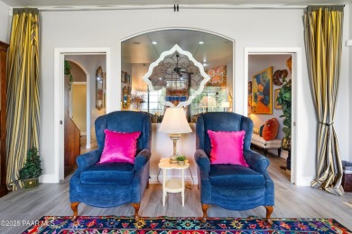 Nestled on a gated 3.39-acre estate in the highly sought-after