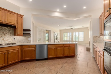 Discover resort-style luxury in the prestigious, gated Corte