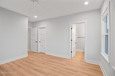 Rare opportunity to own a soundfront luxury duplex townhome in