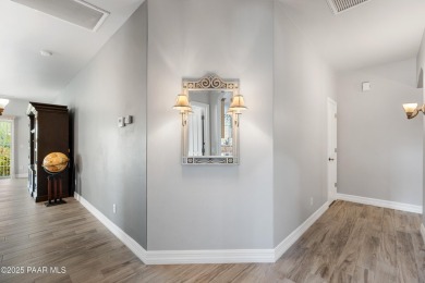 Nestled on a gated 3.39-acre estate in the highly sought-after