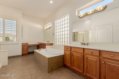 Discover resort-style luxury in the prestigious, gated Corte