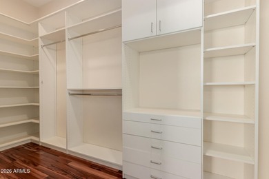 Discover resort-style luxury in the prestigious, gated Corte