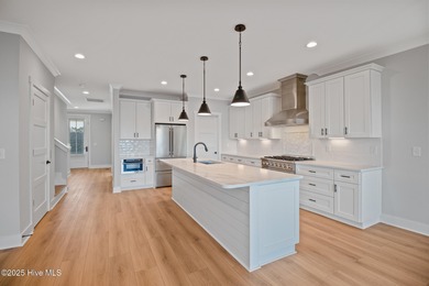 Rare opportunity to own a soundfront luxury duplex townhome in