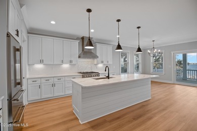 Rare opportunity to own a soundfront luxury duplex townhome in