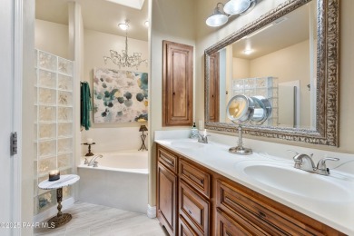 Nestled on a gated 3.39-acre estate in the highly sought-after