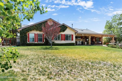 Nestled on a gated 3.39-acre estate in the highly sought-after