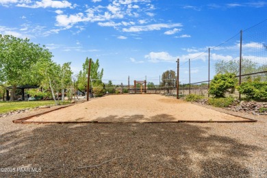 Nestled on a gated 3.39-acre estate in the highly sought-after