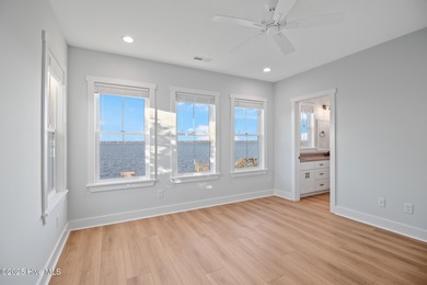 Rare opportunity to own a soundfront luxury duplex townhome in