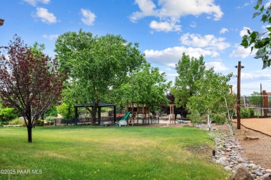 Nestled on a gated 3.39-acre estate in the highly sought-after