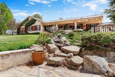 Nestled on a gated 3.39-acre estate in the highly sought-after