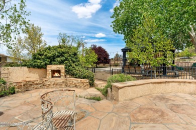 Nestled on a gated 3.39-acre estate in the highly sought-after