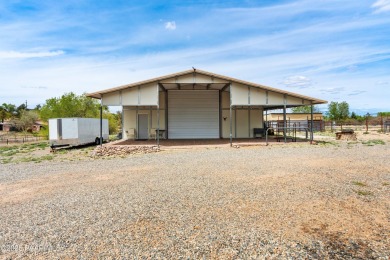 Nestled on a gated 3.39-acre estate in the highly sought-after