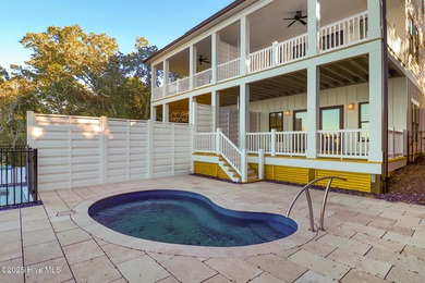 Rare opportunity to own a soundfront luxury duplex townhome in