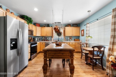 Nestled on a gated 3.39-acre estate in the highly sought-after