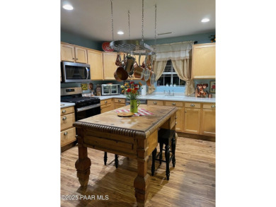 Nestled on a gated 3.39-acre estate in the highly sought-after