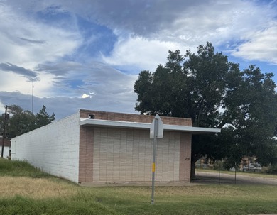 This unique building has 4480 sq. ft of office/multi purpose