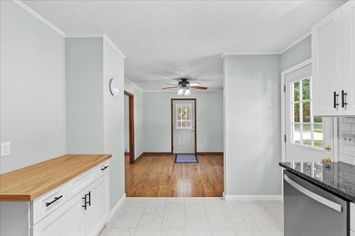 Completely renovated and move-in ready, this beautiful 3-bedroom - photo 9