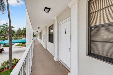 Welcome to this lakefront condominium in Boca Raton offering a - photo 3