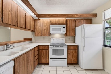 Welcome to this lakefront condominium in Boca Raton offering a - photo 7