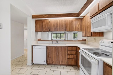 Welcome to this lakefront condominium in Boca Raton offering a - photo 9