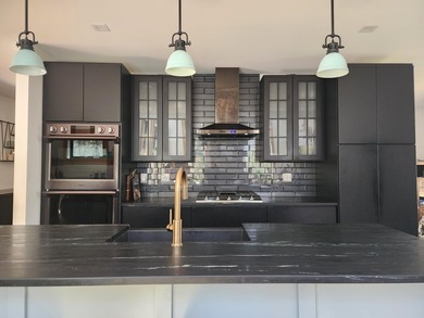 Step into this stunning custom-designed modern farmhouse, where - photo 9