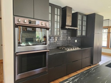 Step into this stunning custom-designed modern farmhouse, where - photo 10