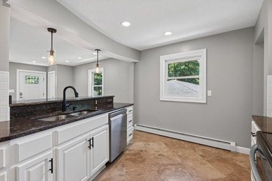 This beautifully updated 3-bedroom, 2-bathroom rambler offers 1 - photo 13