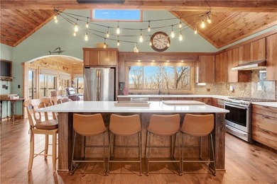 Indulge in waterfront living on approximately 5 serene acres at - photo 24