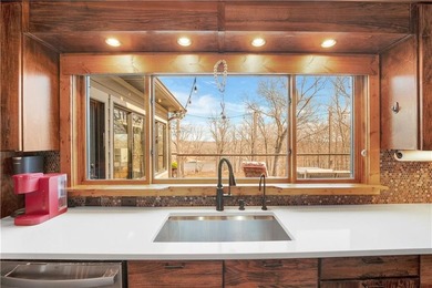 Indulge in waterfront living on approximately 5 serene acres at - photo 28