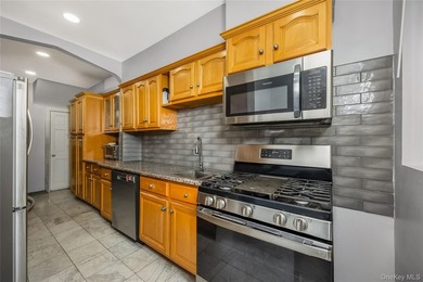Sophisticated Living Across Two Floors & Finished Basement Step - photo 11