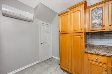 Sophisticated Living Across Two Floors & Finished Basement Step - photo 12