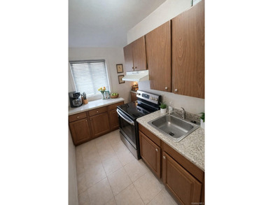 Discover your new beginning in the heart of Islip! This spacious - photo 11