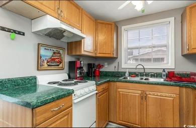 Bright & cheery 2BR/1BA beach cottage, 2024 ROOF & HVAC. Located - photo 12