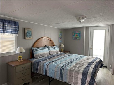 Bright & cheery 2BR/1BA beach cottage, 2024 ROOF & HVAC. Located - photo 18